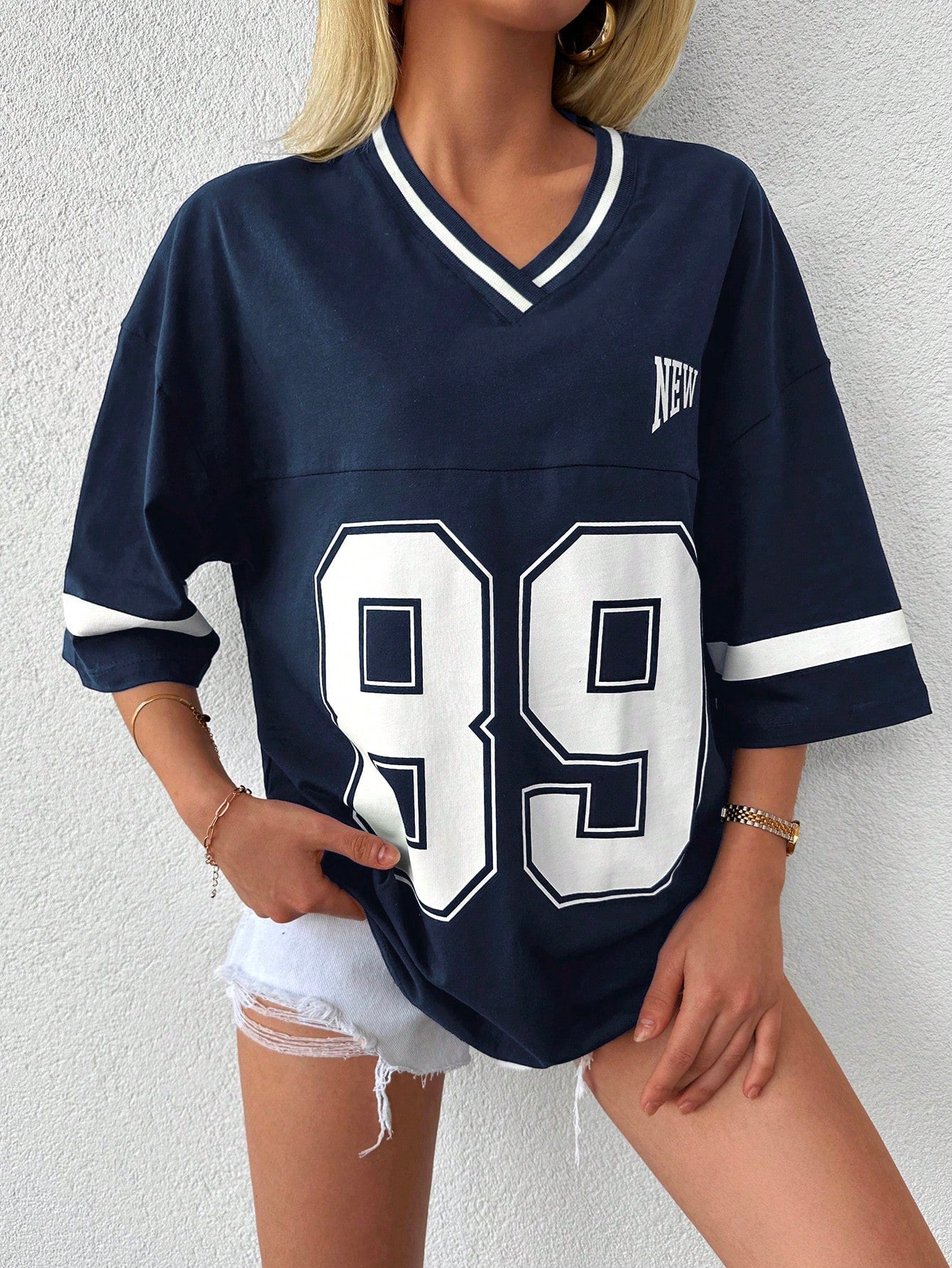 EMELITA | Sportief varsity shirt met V-hals & oversized fit