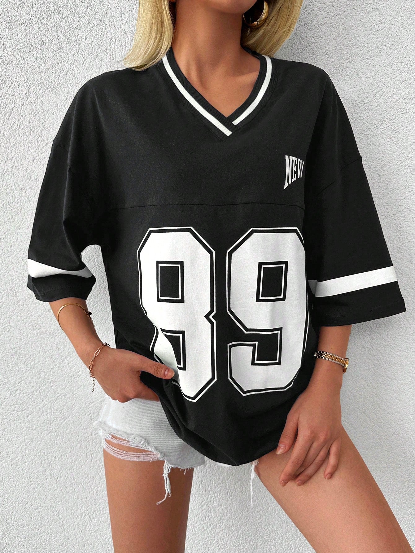 EMELITA | Sportief varsity shirt met V-hals & oversized fit