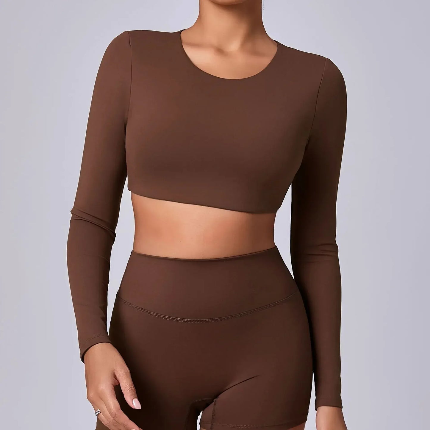 ESTELITA | Sportieve cropped longsleeve met push-up effect