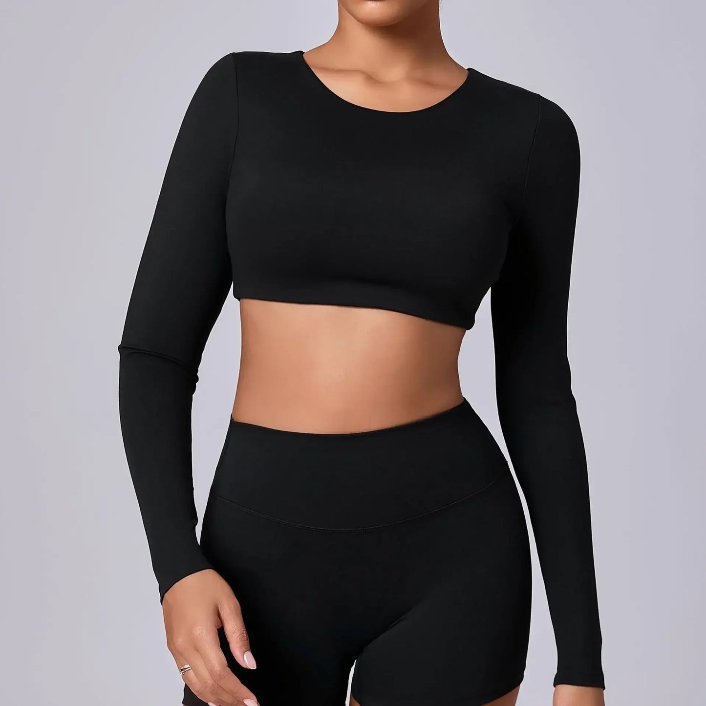 ESTELITA | Sportieve cropped longsleeve met push-up effect