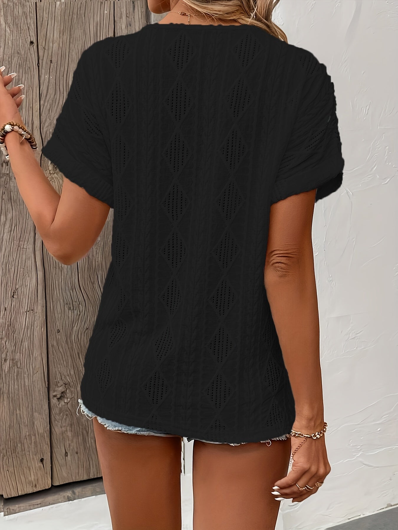 ANGELITA | Gebreide V-hals top met knoopdetail