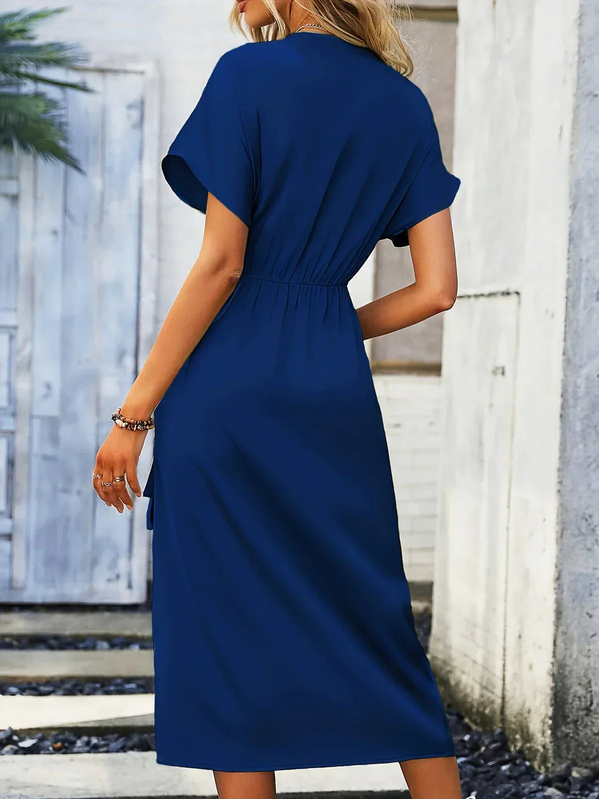 ZENAIDA | Elegante wikkeljurk met verfijnde details