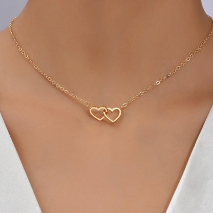 NILDA |  Dubbele hartjesketting – elegant & romantisch