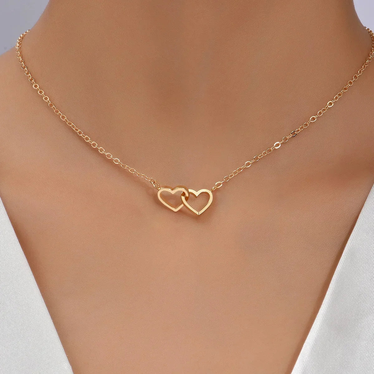 NILDA |  Dubbele hartjesketting – elegant & romantisch