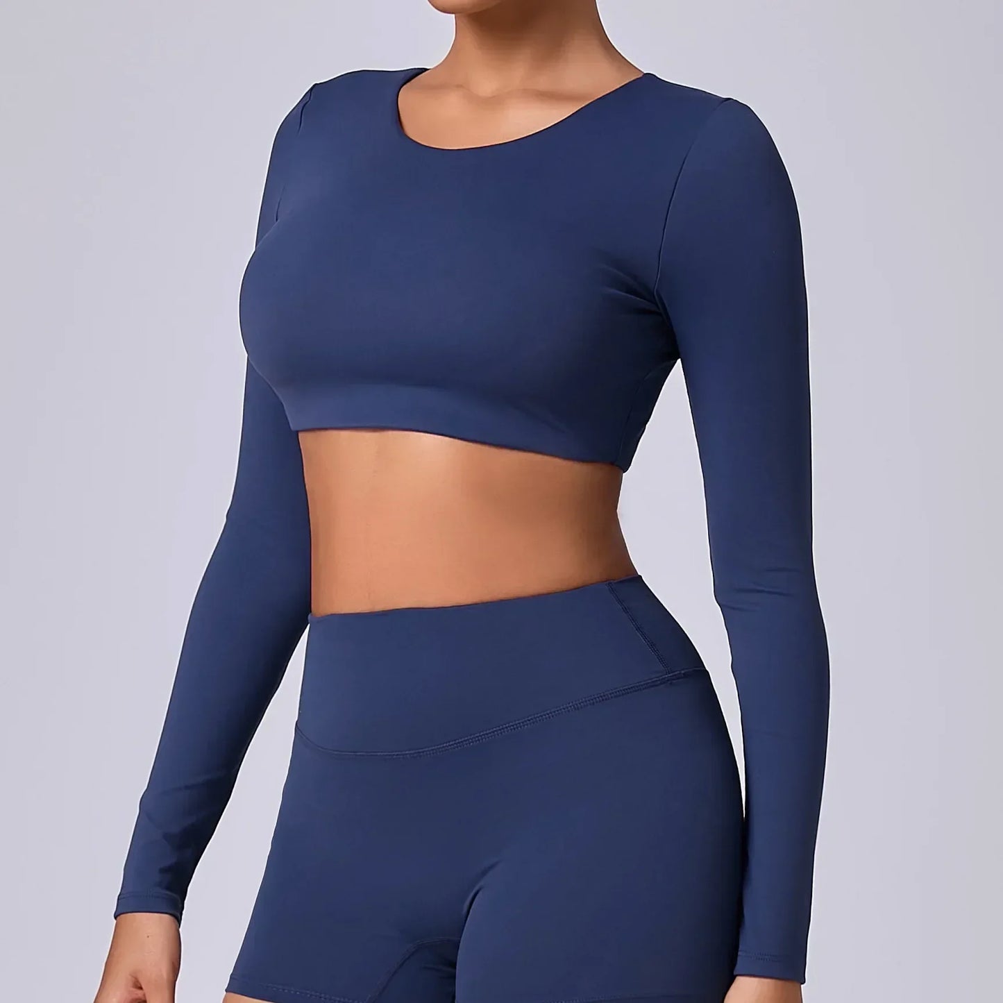ESTELITA | Sportieve cropped longsleeve met push-up effect