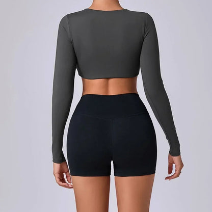 ESTELITA | Sportieve cropped longsleeve met push-up effect