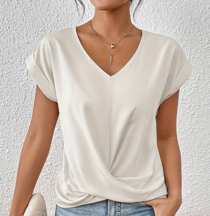JANET | Elegante V-hals top met gewikkelde zoom